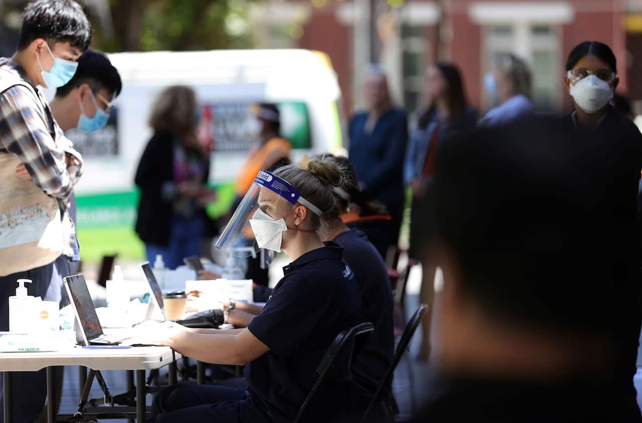 A health worker is seen at a Cohealth pop-up vaccination clinic at the State Library Victoria, in Melbourne