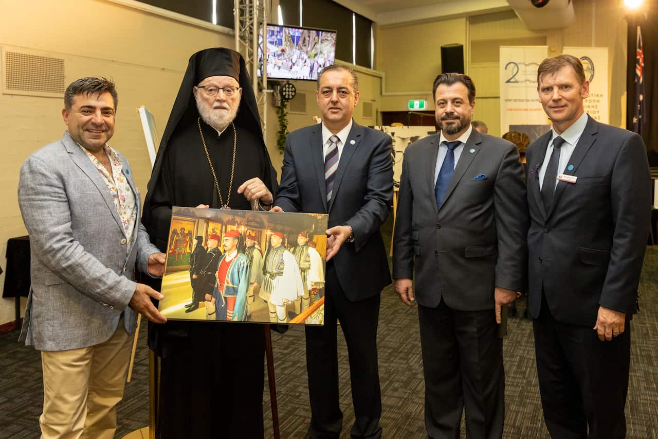L: Nick Bourdaniotis, Bishop Ezekiel, Tony Tsourdalakis, Consul General of Greece Emmanuel Kakavelakis, Oakleigh Grammar Principal Mark Robertson. 