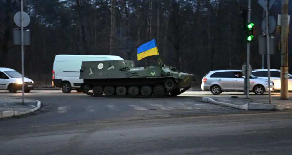 Russian and Ukrainian forces are battling for control of an airbase on the northern outskirts of Kyiv.