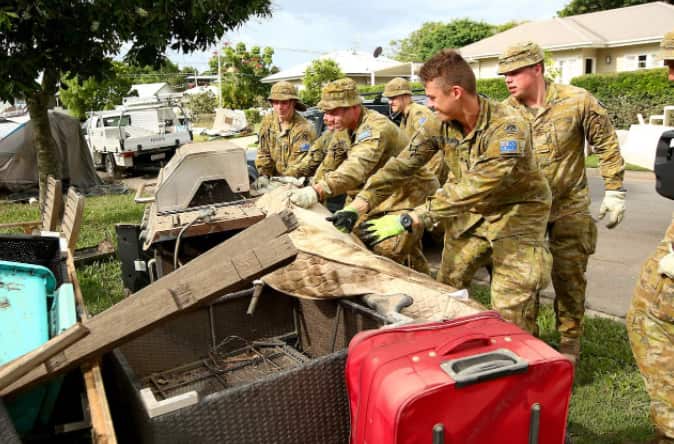 Members of the Army arrive in Fairfield to help residents with clean up in Brisbane on 4 March 2022. 