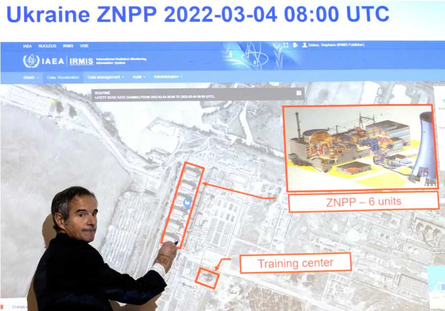 Rafael Grossi, Director General of the International Atomic Energy Agency (IAEA), points on a map of the Ukrainian Zaporizhzhia nuclear power plant.
