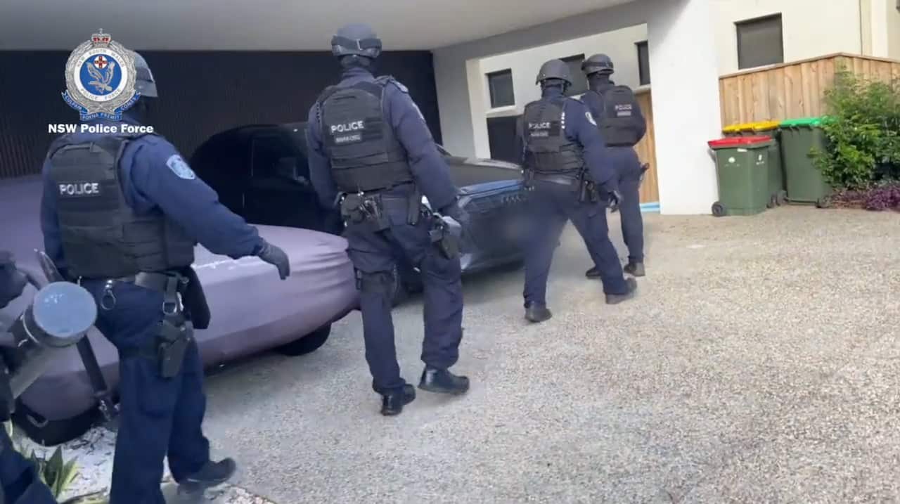 Police executed search warrants at home at Putney.