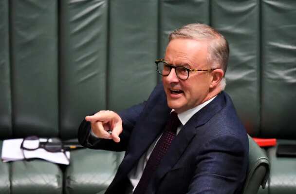 Opposition Leader Anthony Albanese reacts during House of Representatives Question Time at Parliament House in Canberra. 