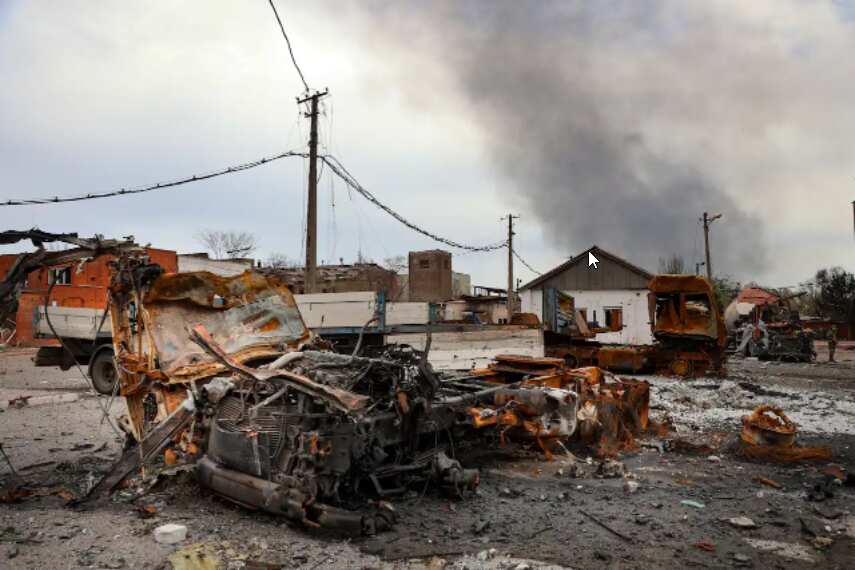 Burned vehicles at the destroyed part of the Illich Iron & Steel Works Metallurgical Plant in an area controlled by Russian-backed separatist forces in Mariupol