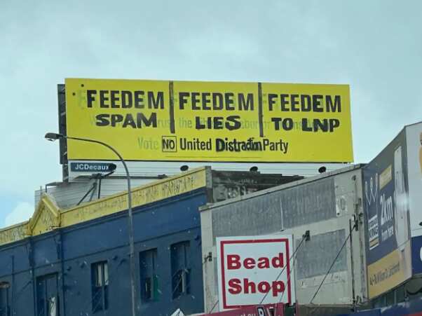 A vandalised United Australia Party billboard on Sydney's Parramatta Road. 