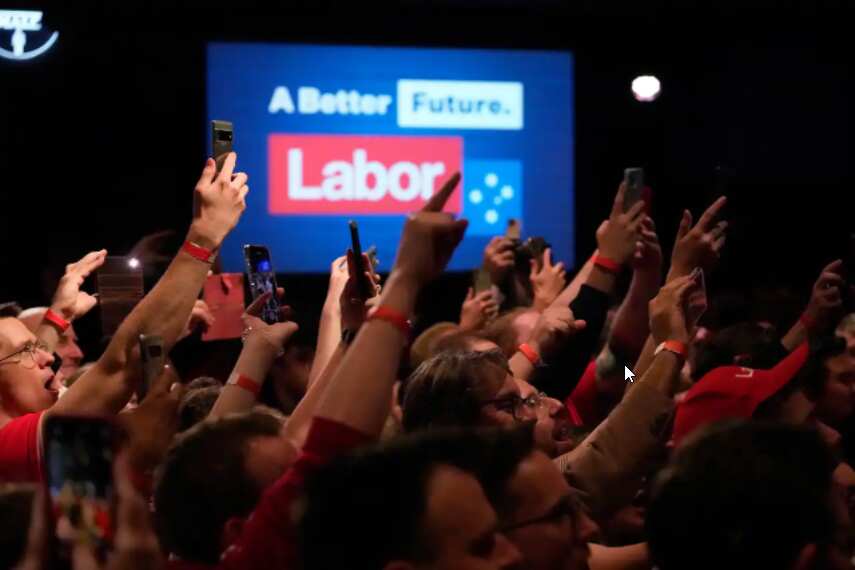 Supporters cheer the arrival of Labor Party leader Anthony Albanese at an event for supporters in Sydney, after Prime Minister Scott Morrison conceded defeat in the federal election