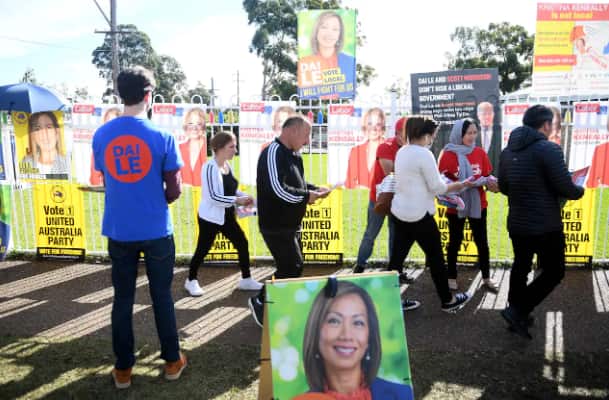 Voters attend an early voting centre at Edensor Park in the federal electorate of Fowler in Sydney, on Thursday, 19 May, 2022.