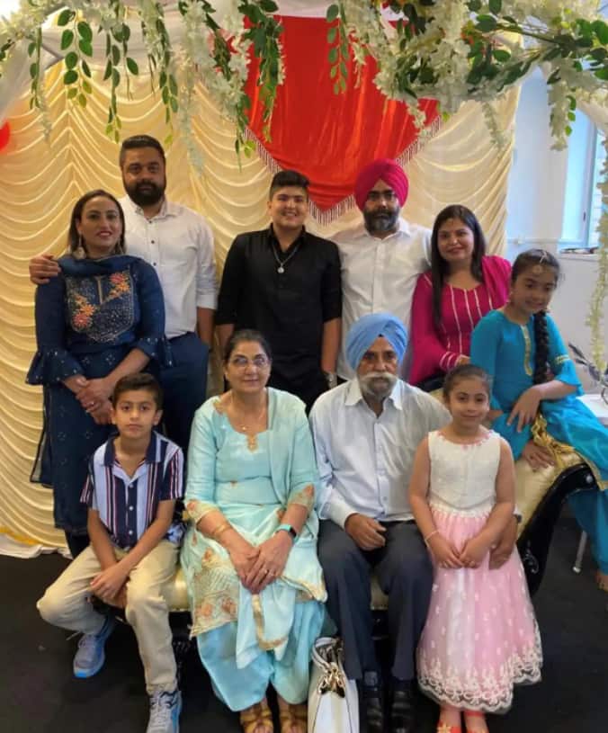 Premdeep Singh Dandiwal (second from left) with his family, including his parents (seated in the front row)