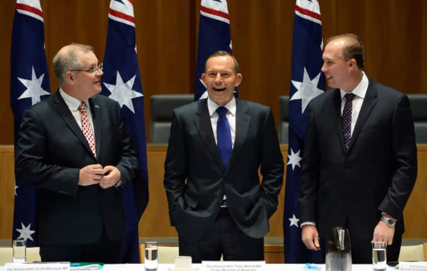 (Left to right) Scott Morrison, then prime minister Tony Abbott, and Peter Dutton at Parliament House in Canberra in 2015.