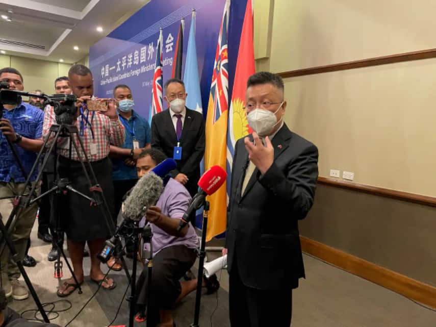 China's ambassador to Fiji, Qian Bo, speaks to reporters