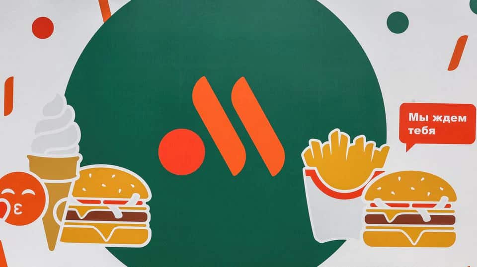 A view shows a banner with the logo of a new restaurant chain, following McDonald's Corp company's decision to sell its restaurants in Russia
