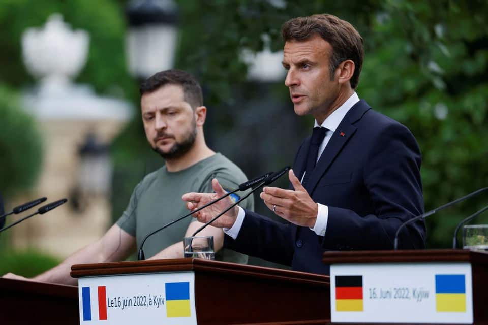Emmanuel Macron speaks as Zelenskiy listens during a joint news conference, as Russia's attack on Ukraine continues, in Kyiv, Ukraine June 16, 2022.