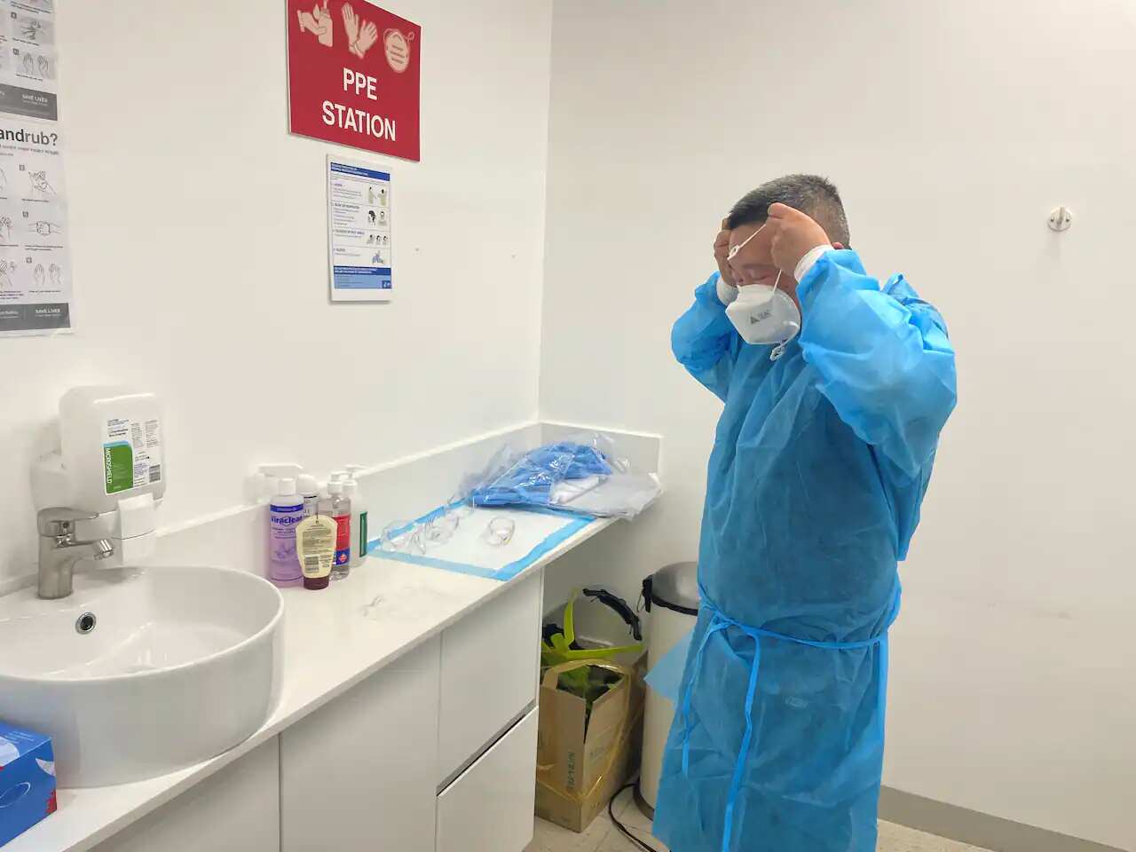 Dr Dong Hua works with COVID-19 positive people day in day out at respiratory clinics in Fairfield and Campbelltown.