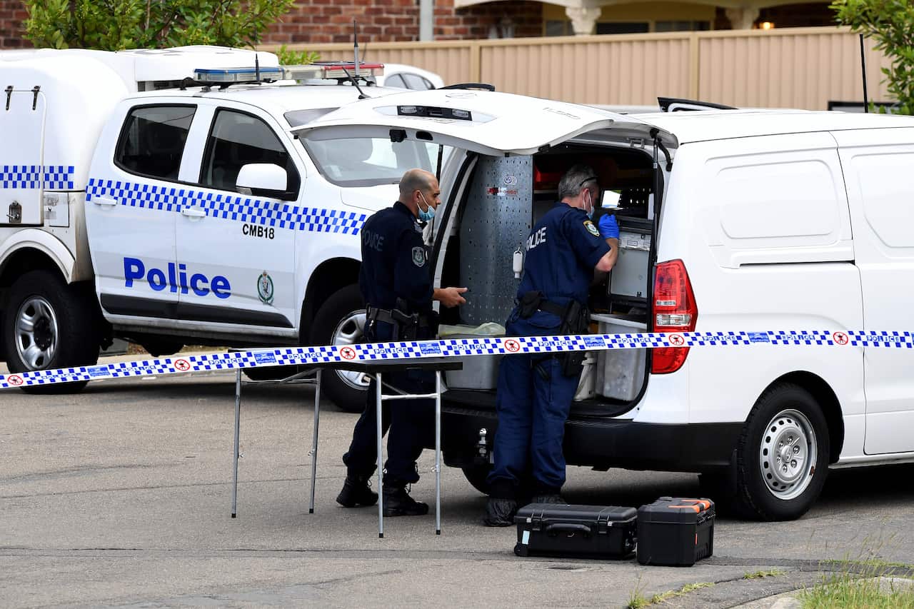 NSW Police Forensic officers and detectives are seen at the scene of a shooting on Rawson Road in south Wentworthville, Sydney, Thursday, January 6, 2022. Sydney's gang war has reignited again, after a man believed to be the brother of Brothers 4 Life gan