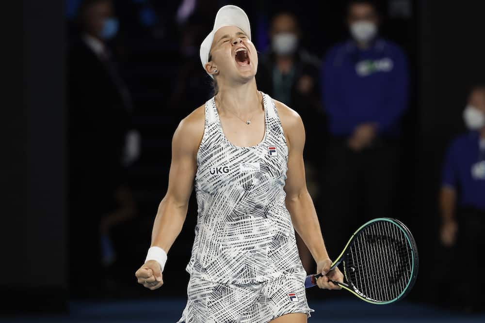 Ash Barty of Australia celebrates after defeating Danielle Collins of the U.S. in the women's singles final at the Australian Open tennis championships in Saturday, Jan. 29, 2022, in Melbourne, Australia. (AP Photo/Hamish Blair)