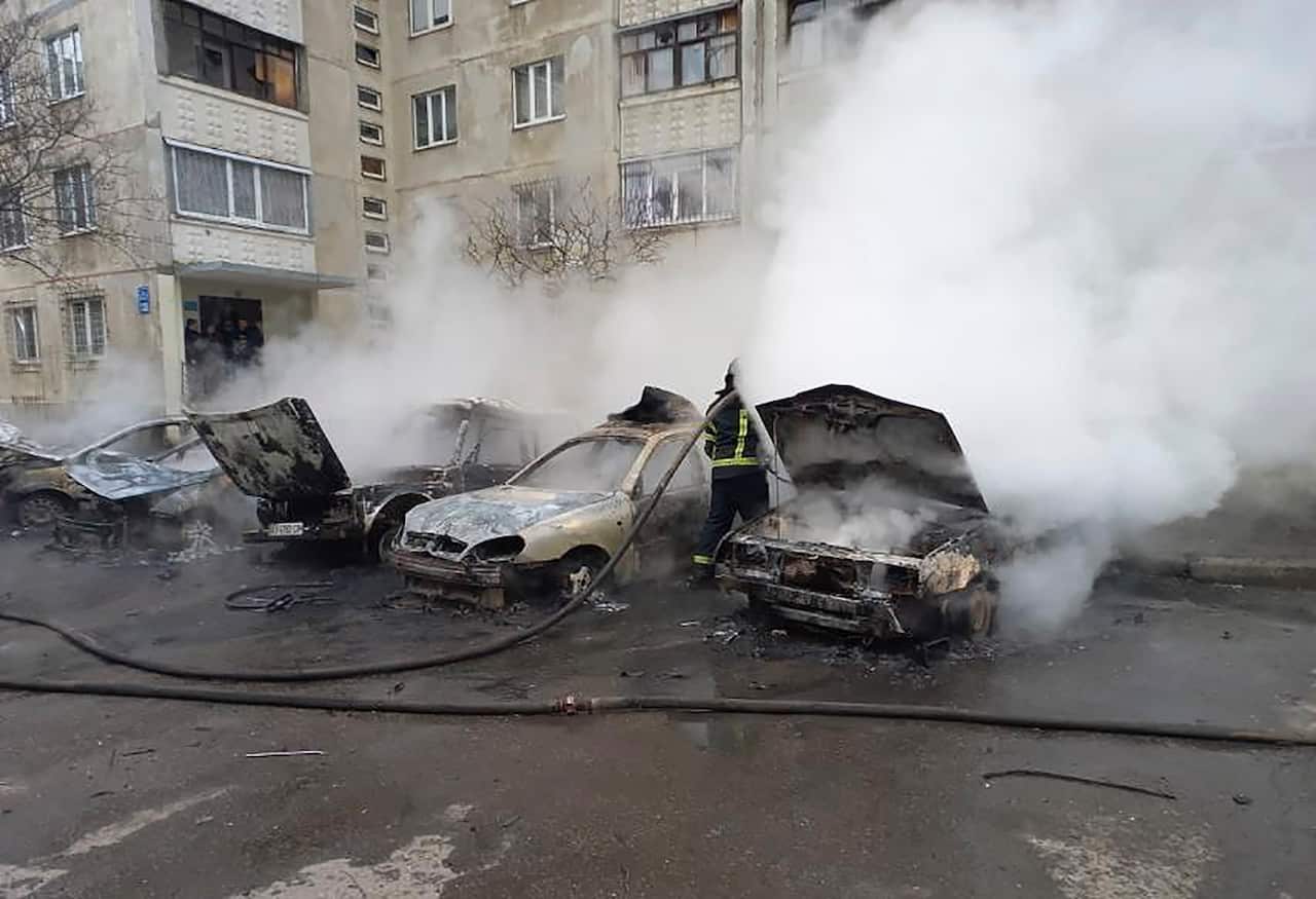 Burnt vehicles after shelling at a residential area in Kharkiv, Ukraine, 28 February 2022
