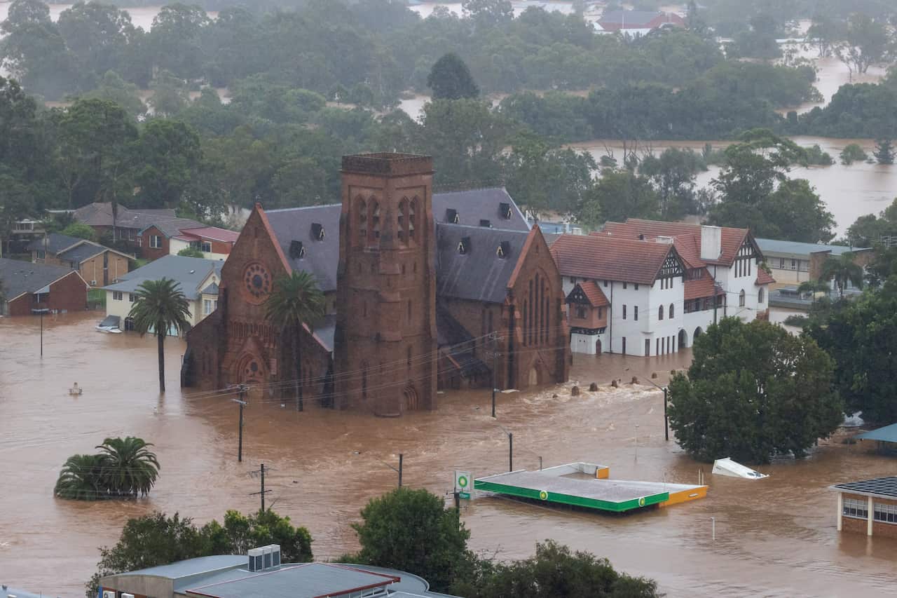 A supplied image shows flood-affected properties in Lismore, NSW on Monday, February 28, 2022. (AAP Image/Supplied by the Department of Defence, Bradley Richardson) NO ARCHIVING, EDITORIAL USE ONLY