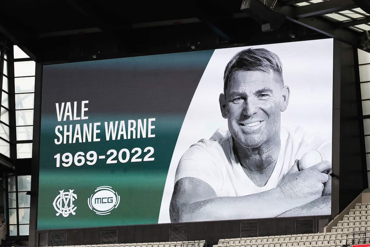 A on screen tribute for Shane Warne is seen on the big screens at the Melbourne Cricket Ground, in Melbourne, Australia, Saturday, March 5, 2022. Warne, widely regarded as one of the greatest players, most astute tacticians and ultimate competitors in the