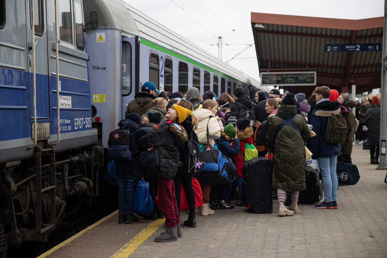 Refugees are boarding on the train to Warsaw to continue their journey.Polish border town of Przemysl remains the biggest arrival hub for Ukrainian refugees. (Photo by Hesther Ng / SOPA Images/Sipa USA)