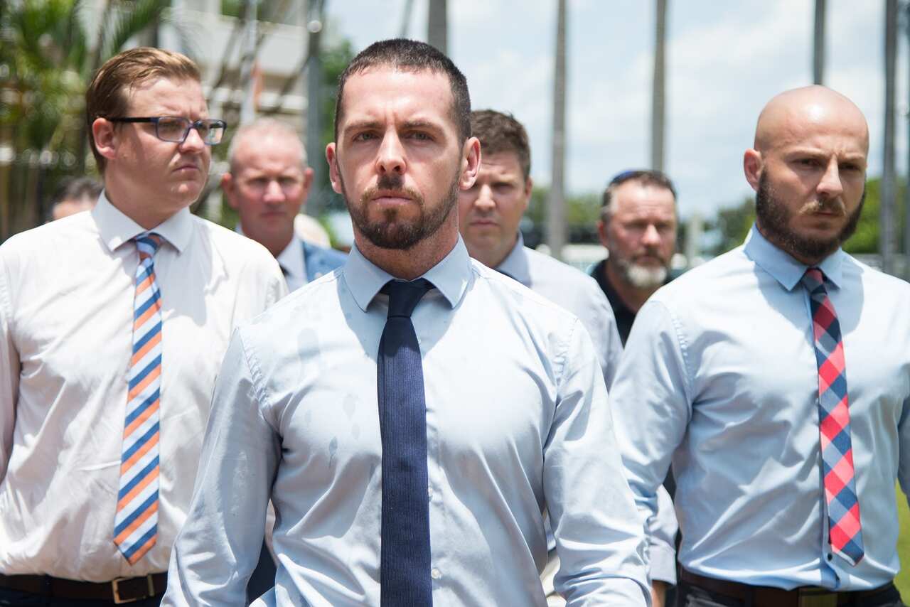 Constable Zachary Rolfe (centre) leaves the Northern Territory Supreme Court in Darwin, March 11