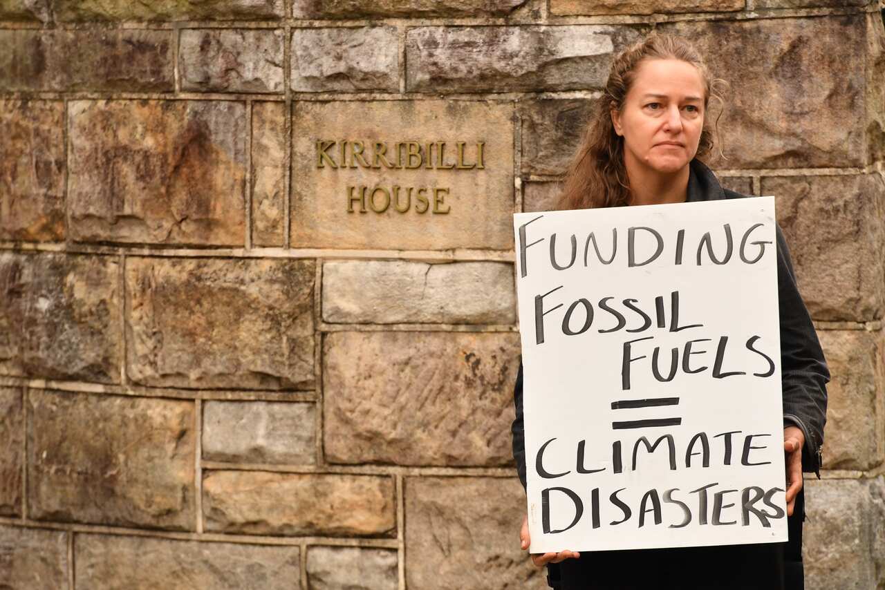 Flood effected residents of Lismore dump household flood damaged items outside the Prime Ministers residence of Kirribilli House in Sydney, Monday, March 21, 2022. (AAP Image/Dean Lewins) NO ARCHIVING