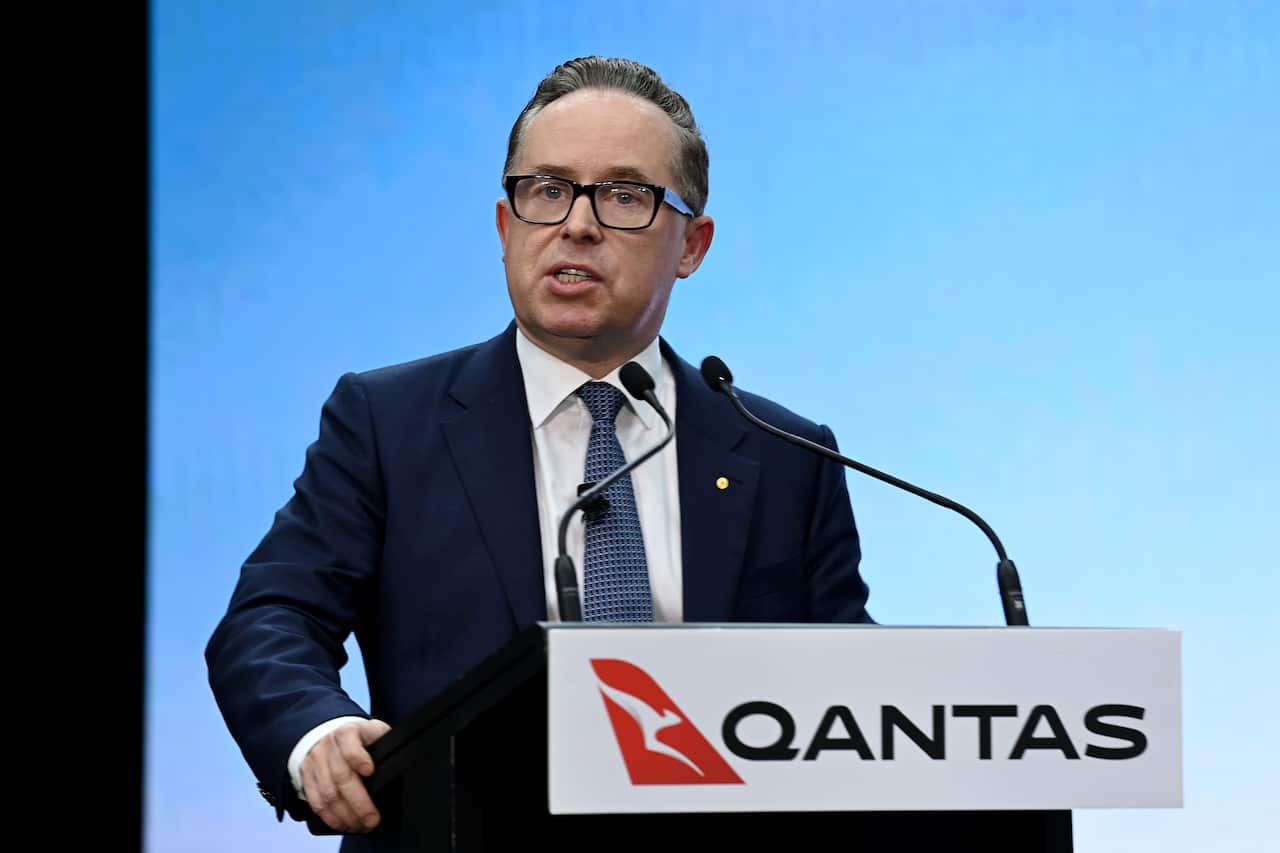Qantas Group CEO Alan Joyce addresses the crowd during a Qantas campaign launch in Sydney, Friday, March 25, 2022. (AAP Image/Bianca De Marchi) NO ARCHIVING