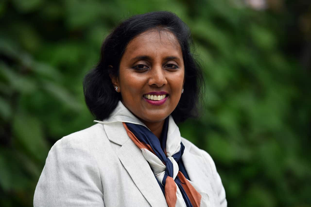 Labor Candidate for Higgins Michelle Ananda-Rajah poses for a photo at a pre-polling booth at St George’s Anglican Church Malvern, Melbourne, Thursday, May 12, 2022. (AAP Image/Joel Carrett) NO ARCHIVING