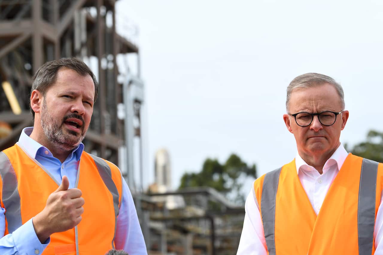 Labor leader Anthony Albanese and Minister Ed Husic (right) speak to the media during a press conference after touring the Northern Oil Refinery.