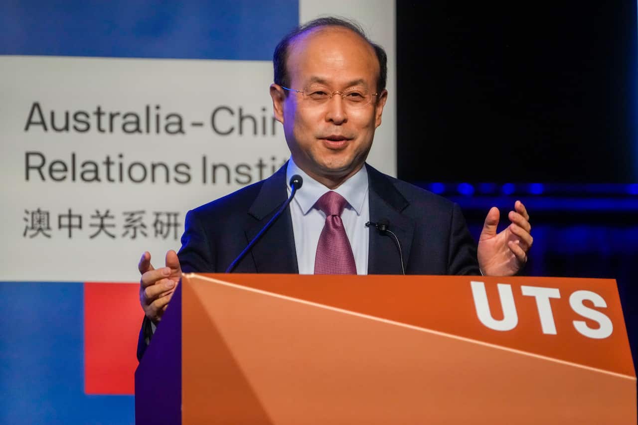 China's Ambassador to Australia, Xiao Qian gestures during his address on the state of relations between Australia and China at the University of Technology in Sydney,Australia, Friday, June 24, 2022.