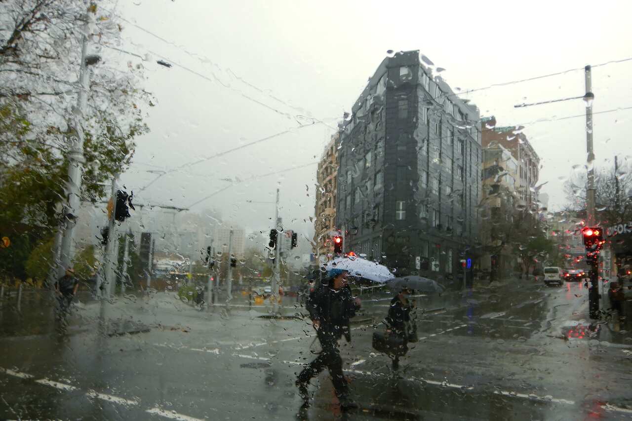 Wet weather batters Sydney as heavy rain causes flash flooding, Sydney, Saturday, July 2, 2022. Multiple weather warnings are in place for NSW as a dangerous weather system sets in, bringing heavy rains, the threat of flooding and possible landslips. (AAP