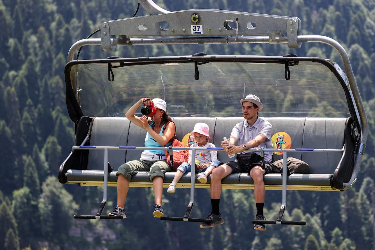 SOCHI, RUSSIA - JULY 6, 2022: Holidaymakers use a chairlift to travel across the Rosa Khutor all-season mountain resort. Dmitry Feoktistov/TASS/Sipa USA