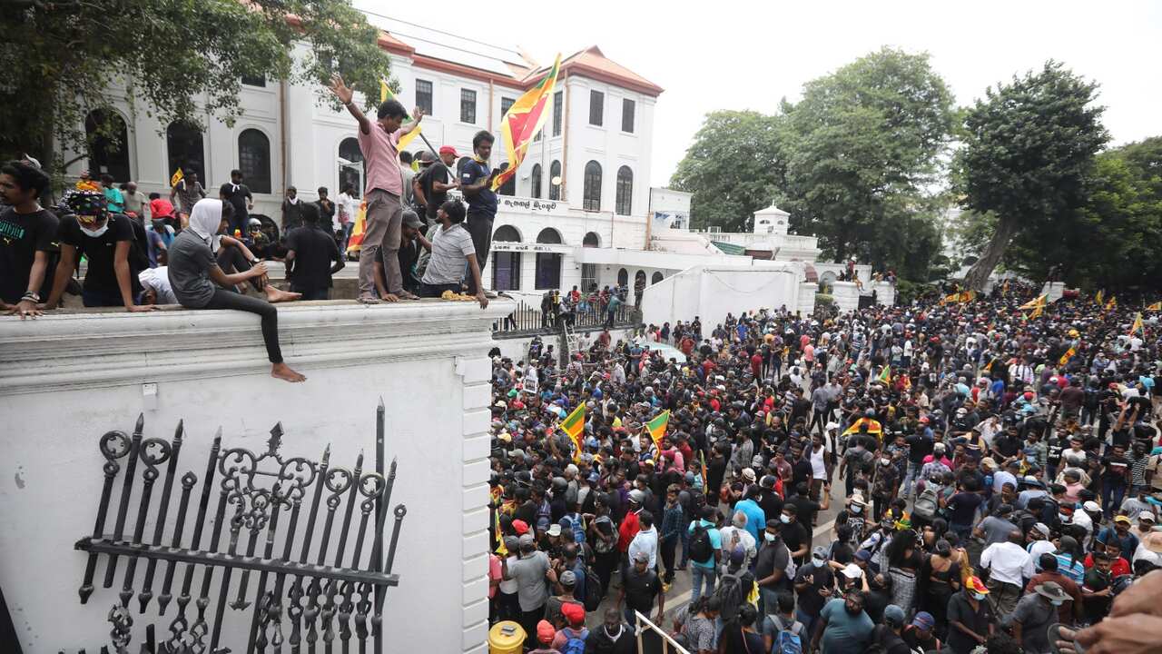 Thousands of protesters broke through police barricades and stormed the president's official residence during the anti government protest in Colombo, Sri Lanka,