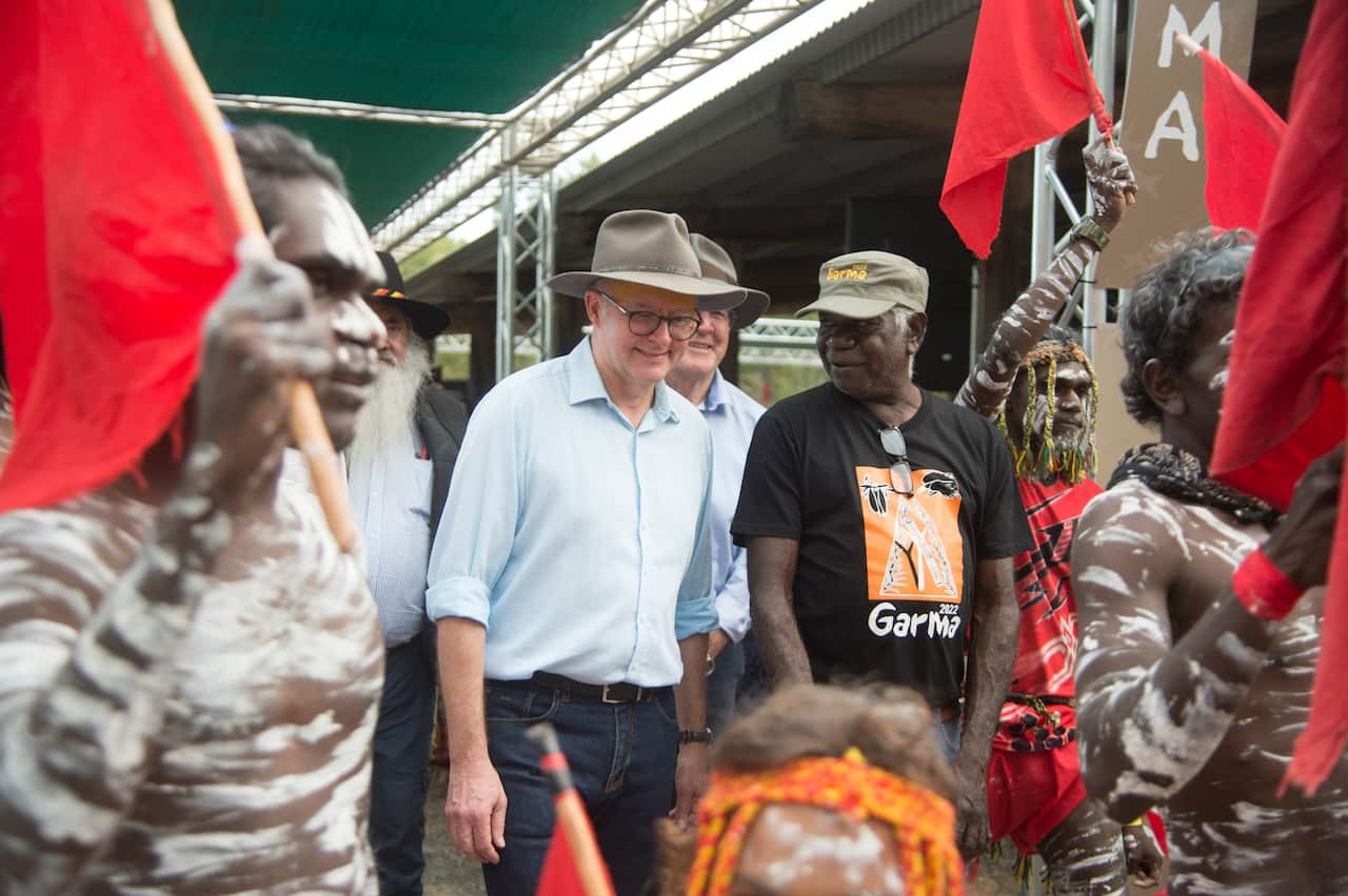 Prime Minister Anthony Albanese with Yothu Yindi board member Djaawa Yunupingu during the 2022 Garma Festival. 