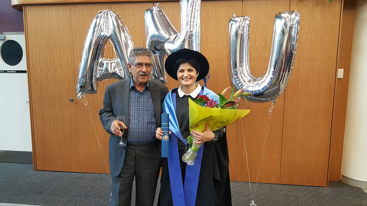Dr Noushin Nasiri at her graduation with her father Mr Ebrahim Nasiri.