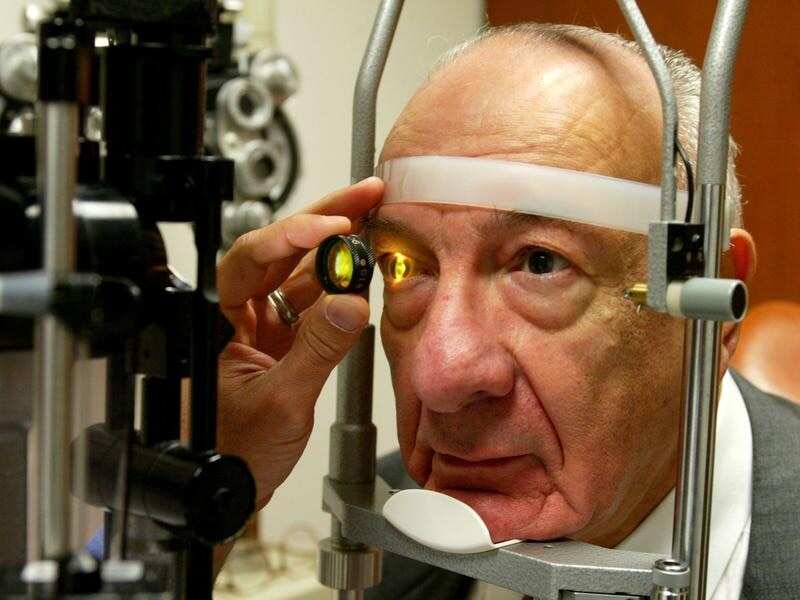Ernest Hayeck has his eye's retina examined