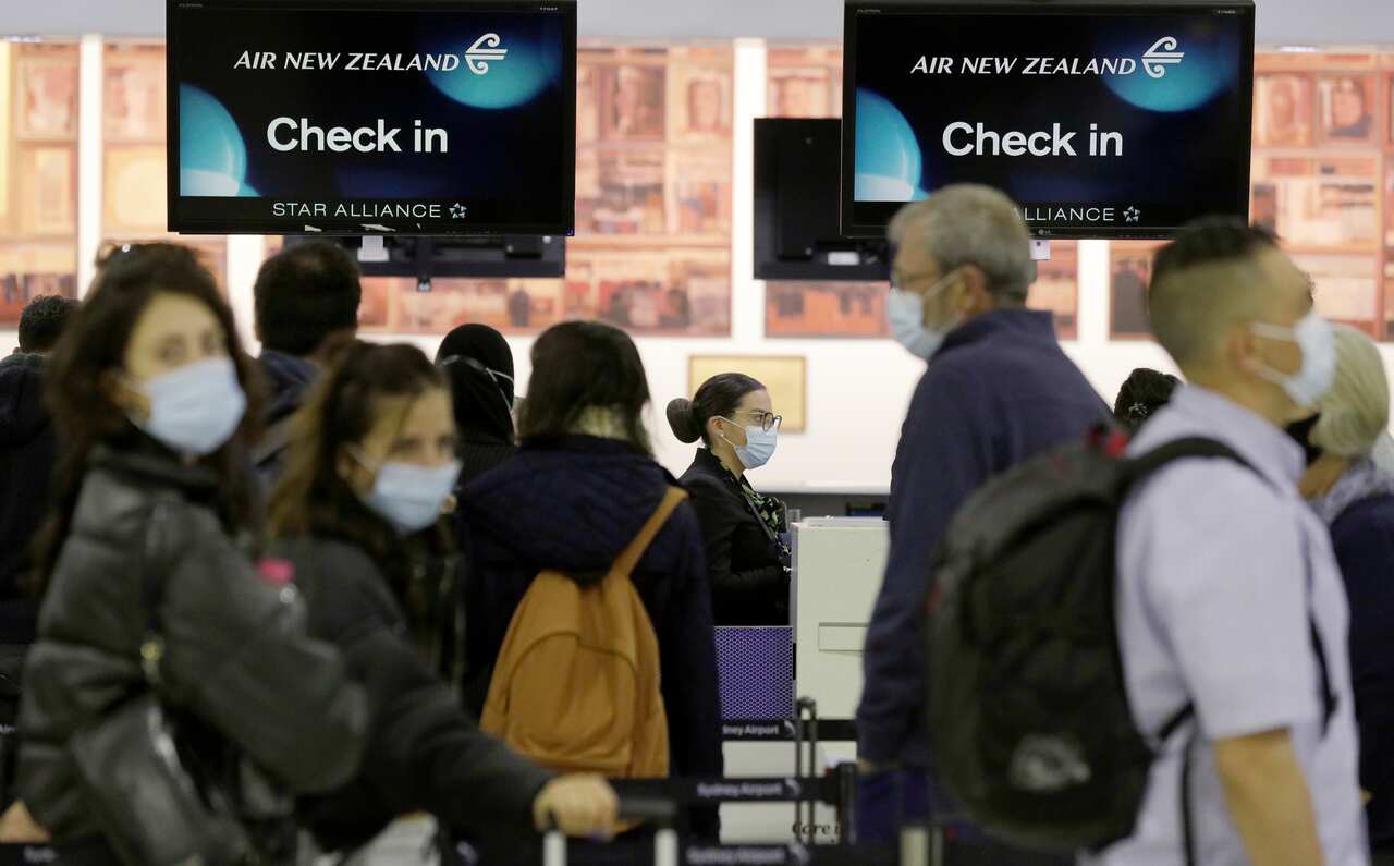 Passengers at Sydney Airport prepare to travel to New Zealand earlier this year.
