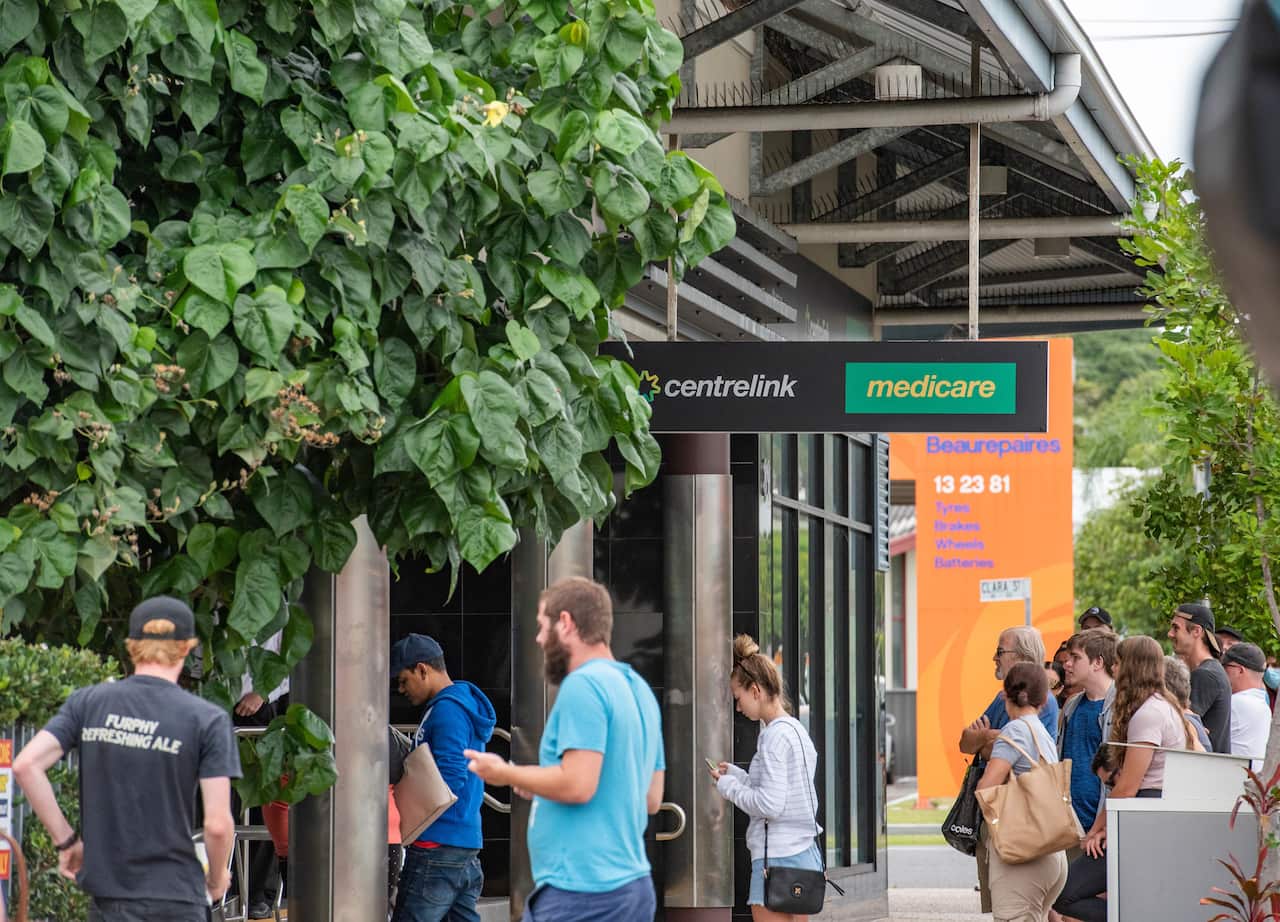 Australians queue at Centrelink during covid-19 pandemic.