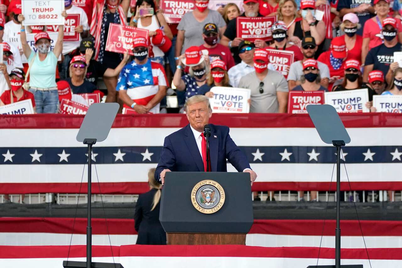 President Donald Trump delivers remarks to supporters at a campaign rally Friday, Oct. 23, 2020, in The Villages, Fla. (AP Photo/John Raoux)