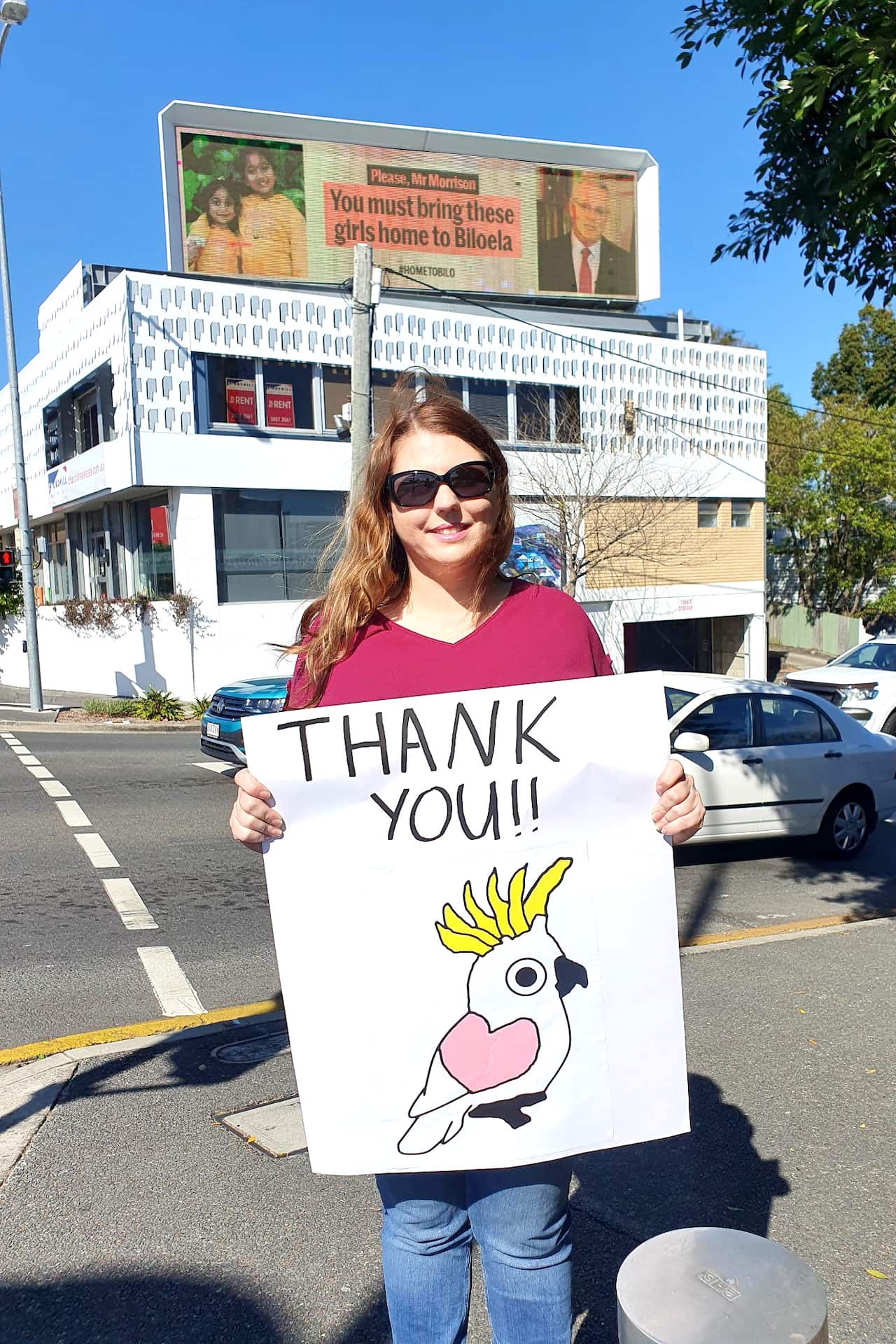 Billboard with the request to "Bring them to Biolela" 