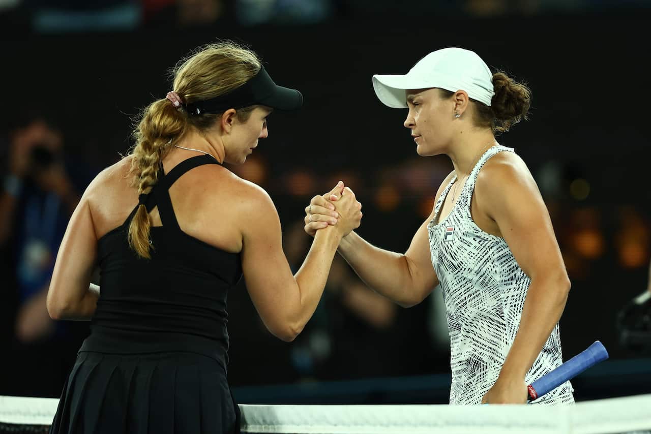 Ash Barty shakes hands with Danielle Collins of United States after winning the Australian Open title. 