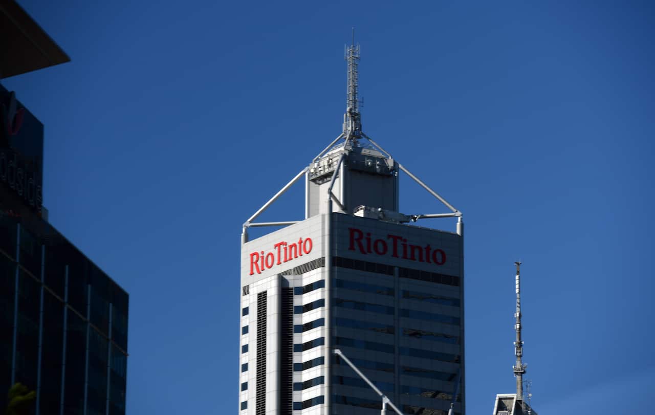 The logo of miner Rio Tinto is seen on an office tower in Perth, Monday, May 23, 2016. (AAP Image/Mick Tsikas) NO ARCHIVING