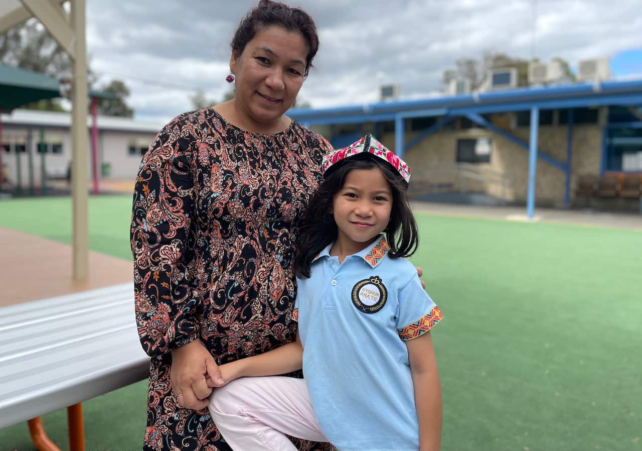 Zulfiya Abdulla and her daughter at the Uyghur Language School of South Australia. 