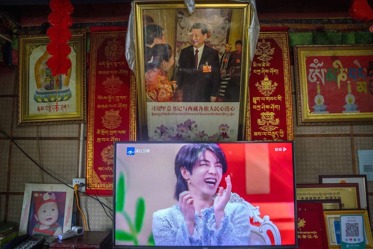 FILE - In this June 4, 2021, file photo, a television shows a broadcast of a Chinese talk show program (AP Photo/Mark Schiefelbein, File)
