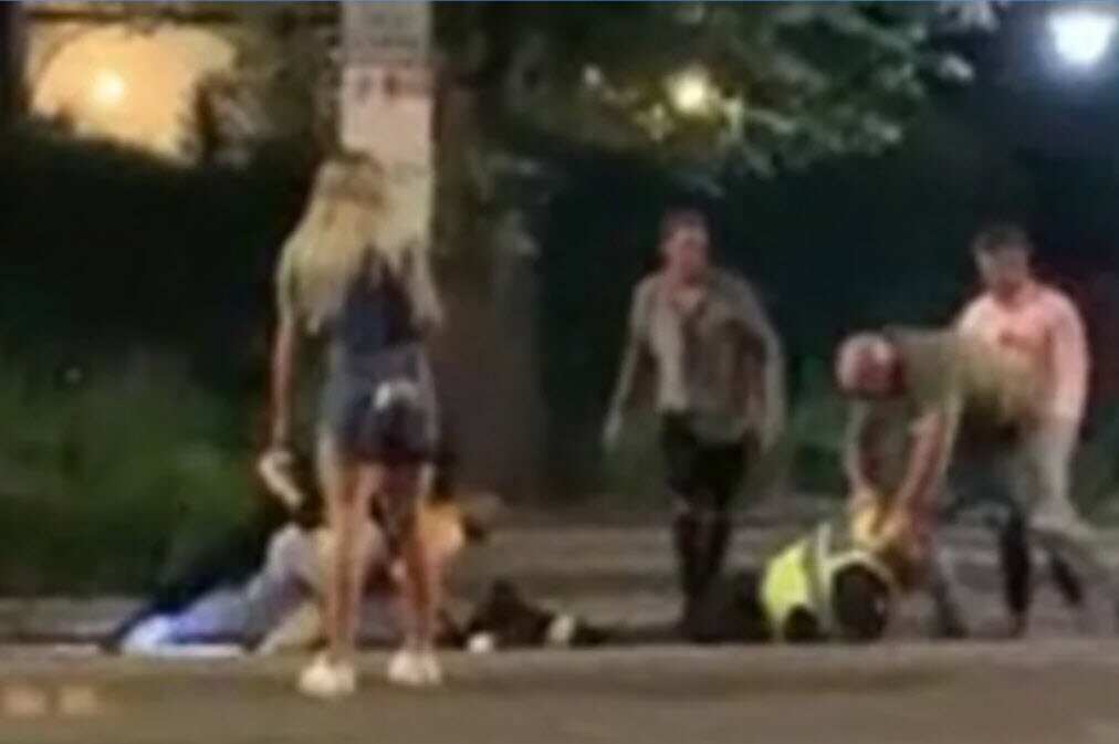 Six charged following violent assault in St Kilda.