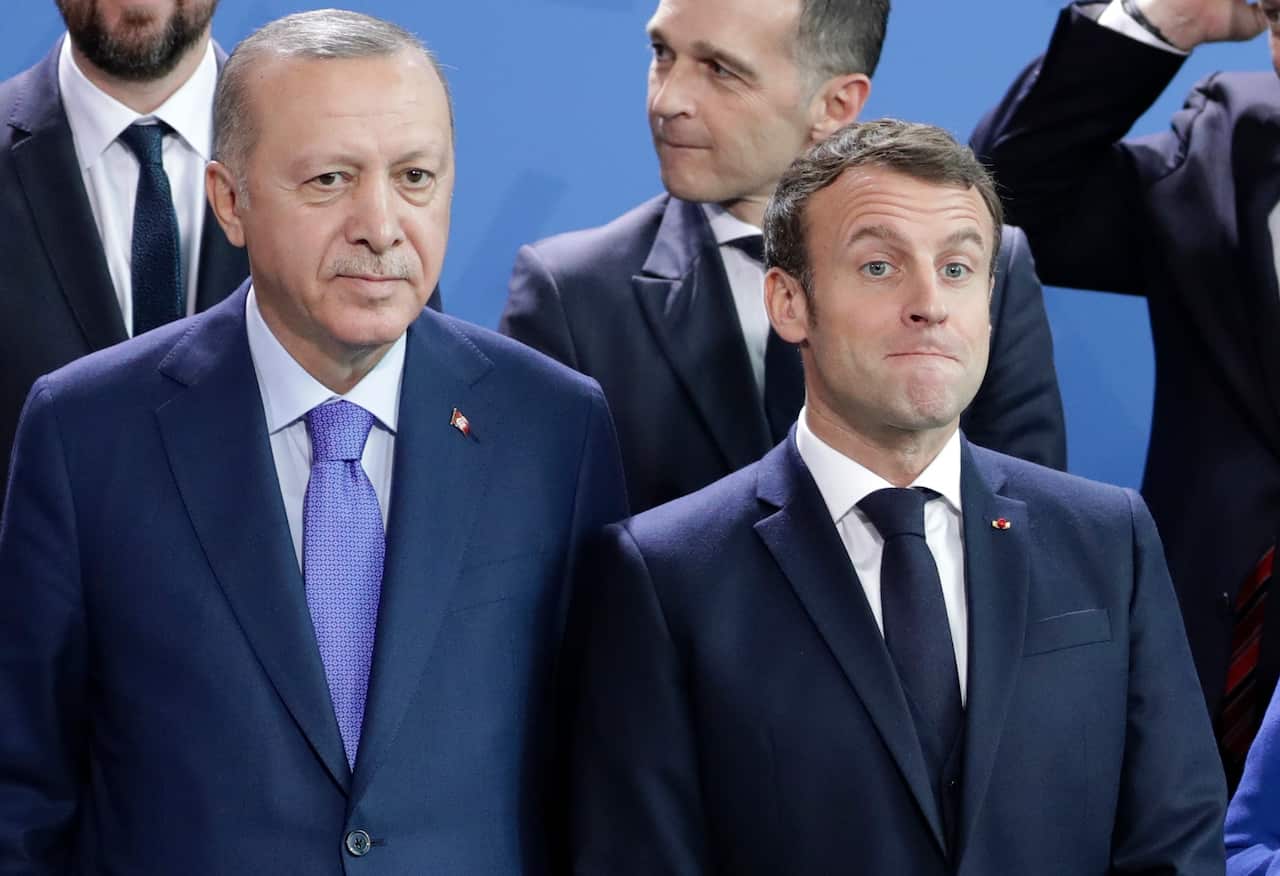 A file photo of Turkish President Recep Tayyip Erdogan and French President Emmanuel Macron.