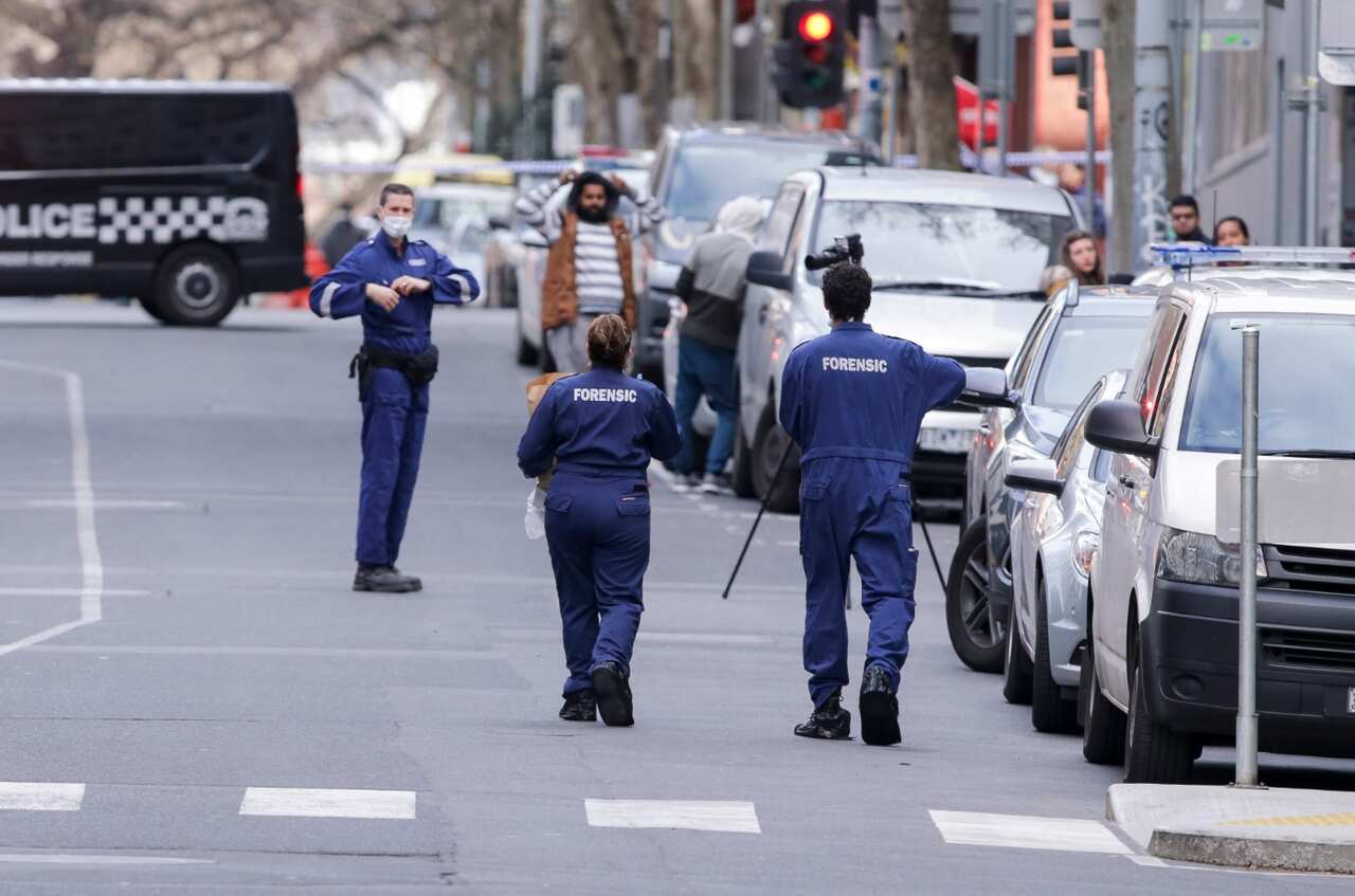Police investigate a crime scene at the EQ Arcade building on A'Beckett Street in Melbourne, Saturday, July 21, 2018.