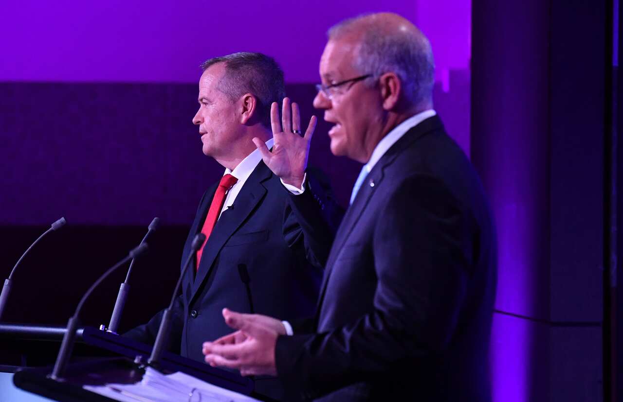 Leader of the Opposition Bill Shorten and Prime Minister Scott Morrison during the third Leaders Debate at the National Press Club in Canberra, Wednesday, May 8, 2019. (AAP Image/Mick Tsikas) NO ARCHIVING