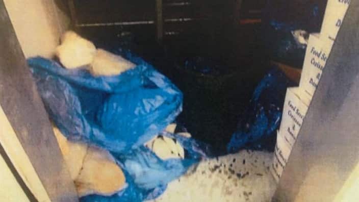 Food uncovered and stored on the freezer floor