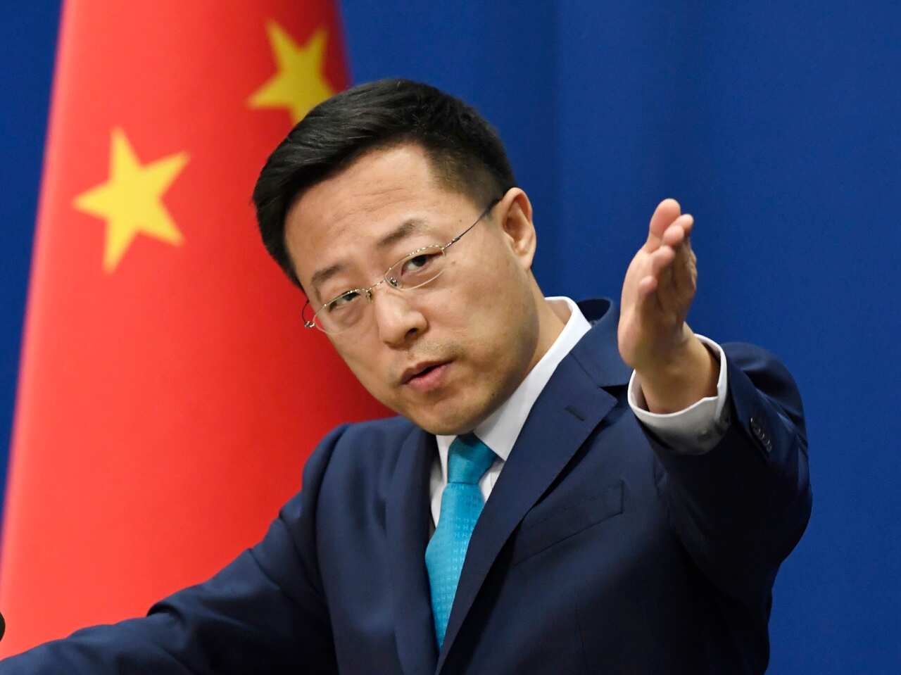 Chinese Foreign Ministry spokesman Zhao Lijian speaks at a press conference in Beijing on March 5, 2020. (Kyodo via AP Images) ==Kyodo