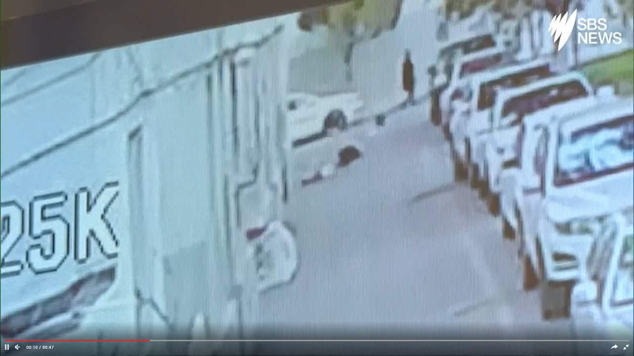 Security camera shows the moment a man saves falling child